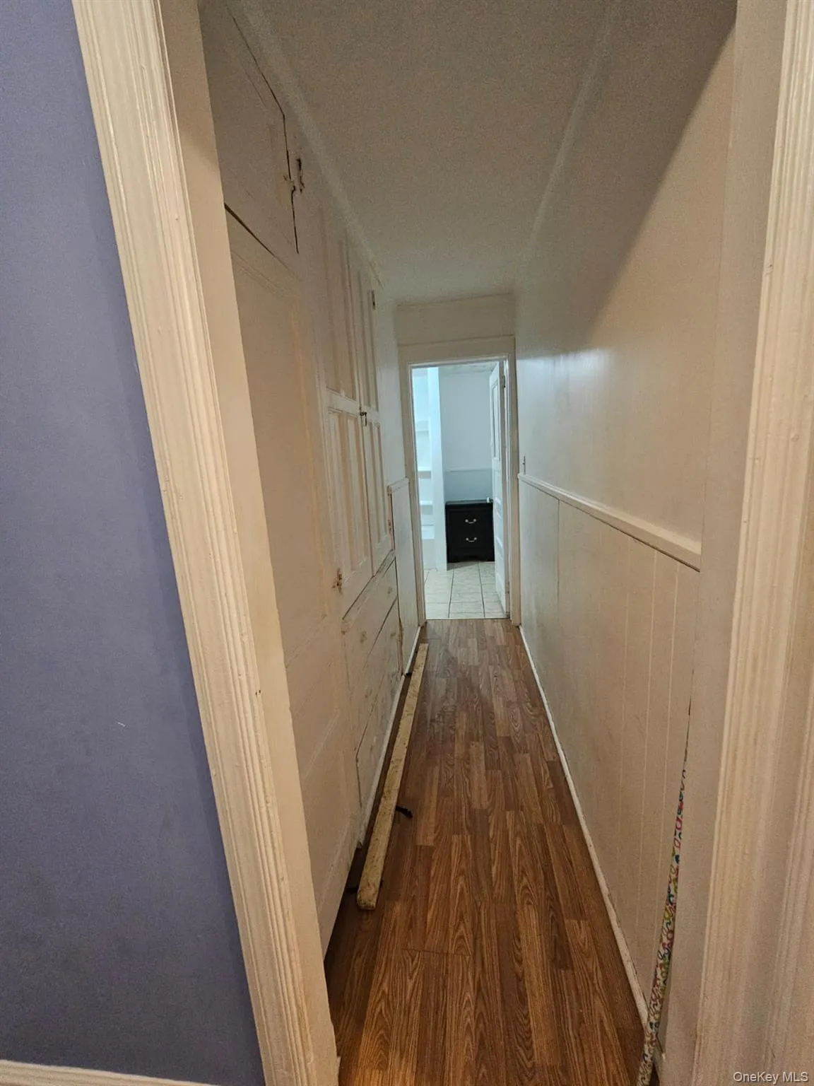 Hallway with dark wood-type flooring Hallway with dark wood-type flooring