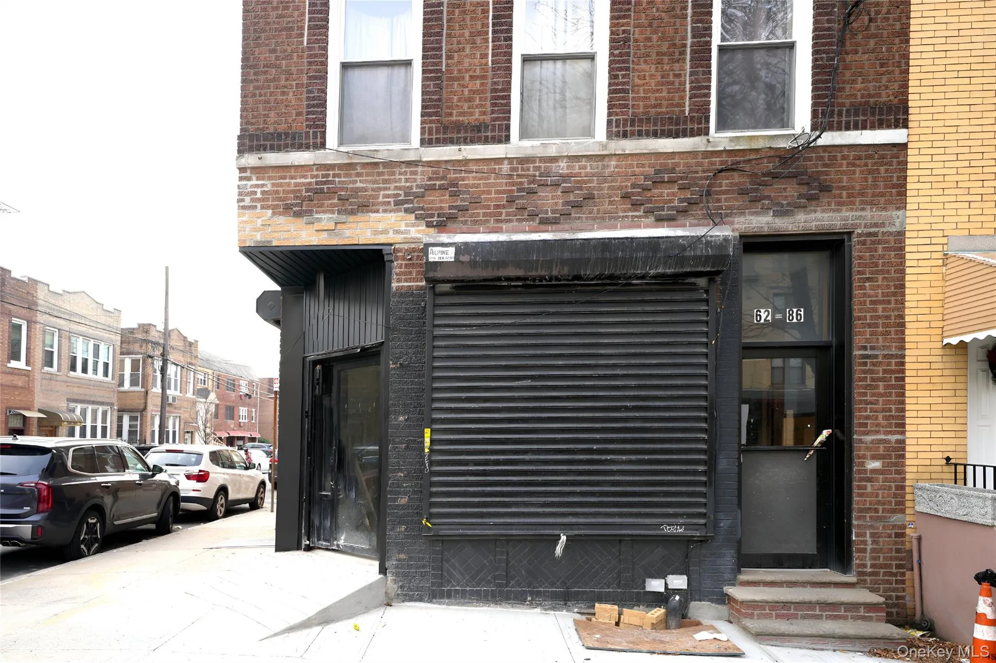 View of exterior entry with brick siding View of exterior entry with brick siding