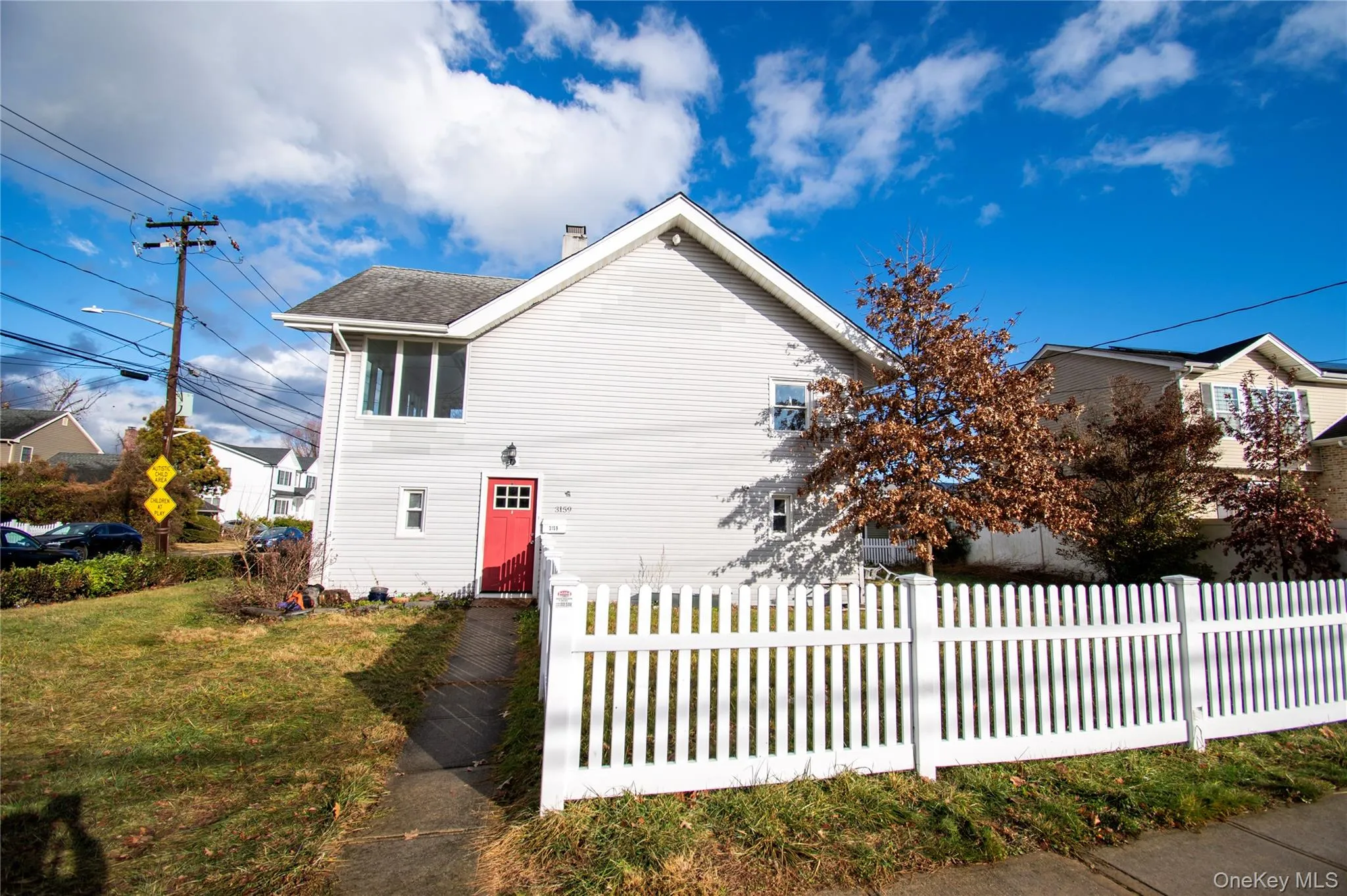 View of front of home featuring a chimney View of front of home featuring a chimney