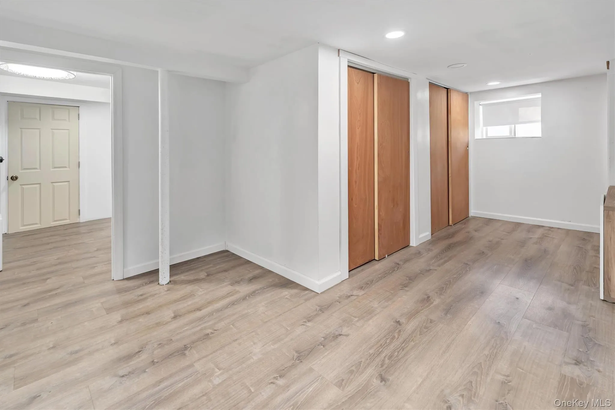 Bonus room with recessed lighting and light wood finished floors Bonus room with recessed lighting and light wood finished floors
