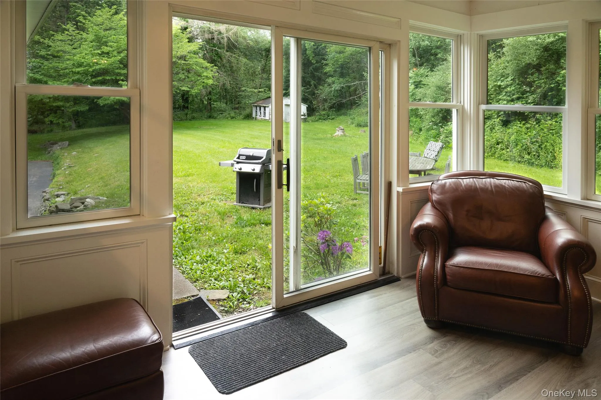 Entryway with wood finished floors Entryway with wood finished floors