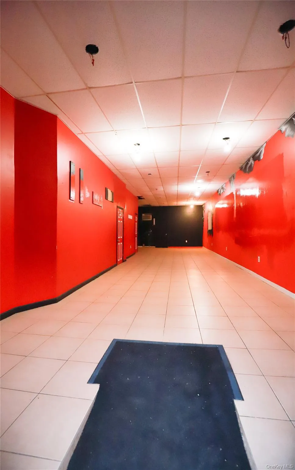 Misc room with a drop ceiling Misc room with a drop ceiling