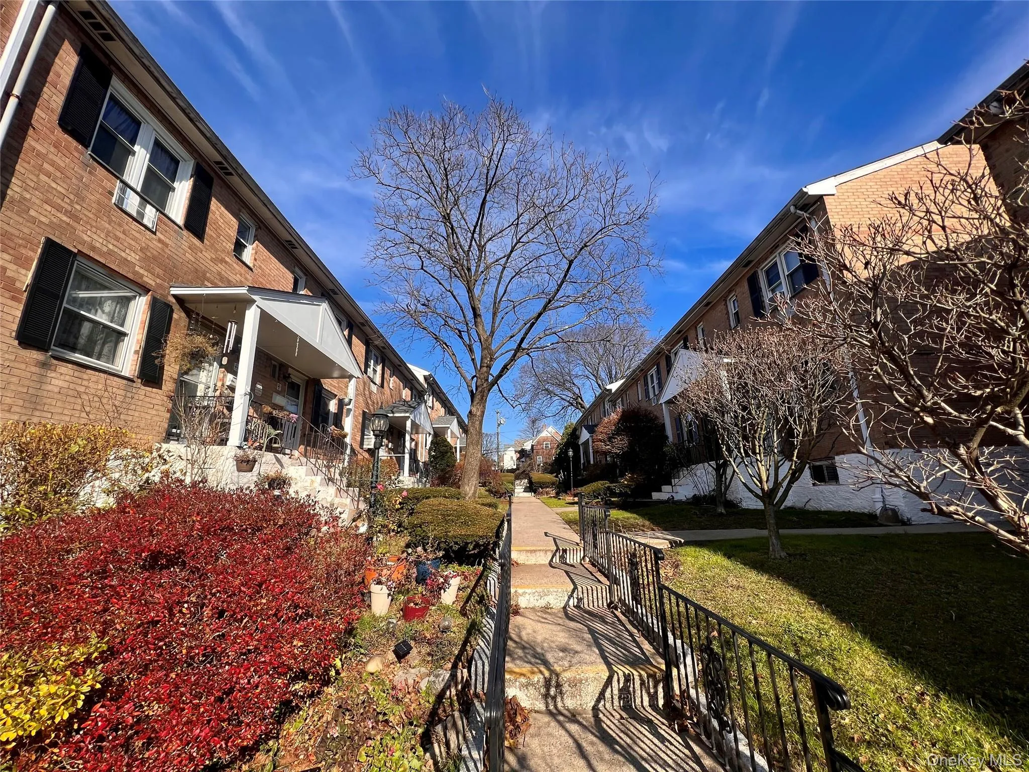 View of community featuring a lawn and a residential view View of community featuring a lawn and a residential view