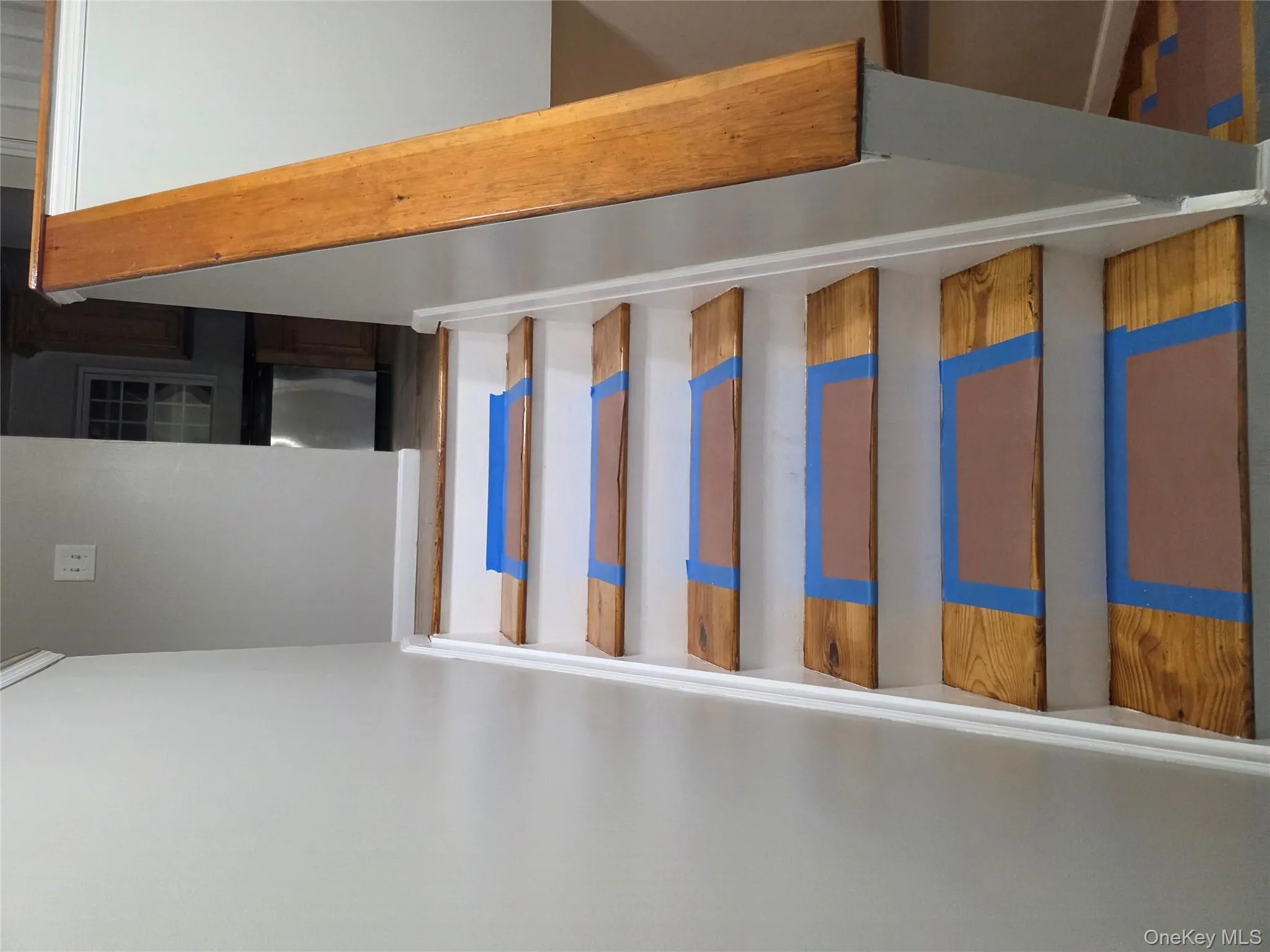 Stairs featuring baseboards Stairs featuring baseboards