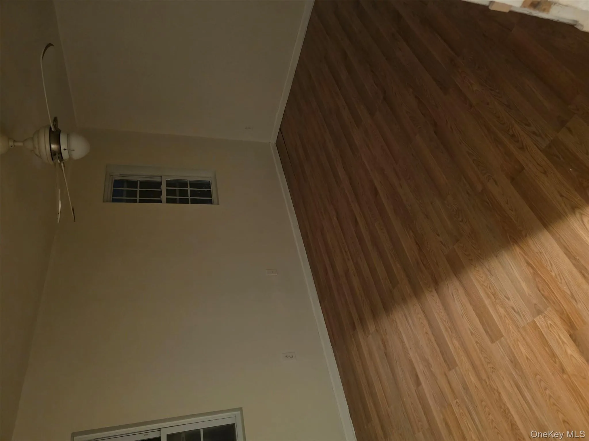 Spare room with light wood-style flooring and ceiling fan Spare room with light wood-style flooring and ceiling fan