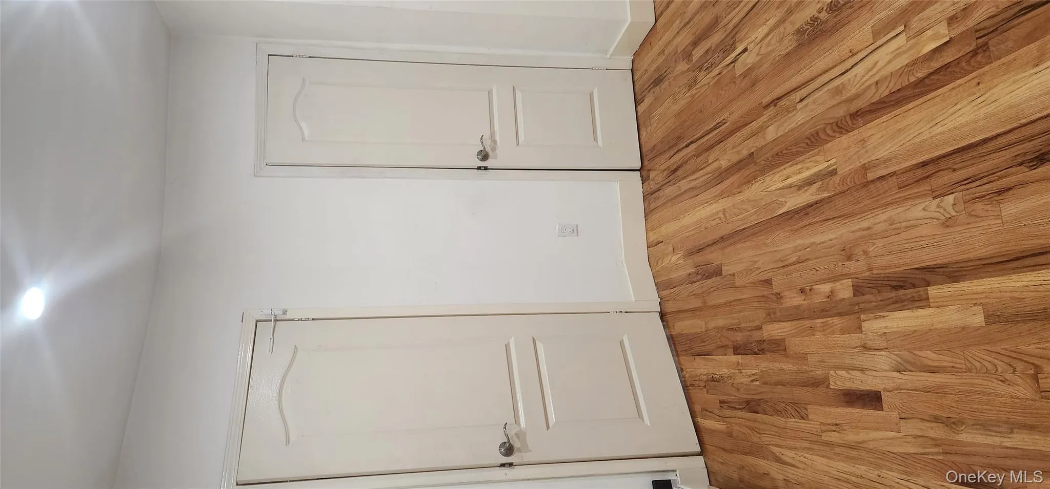 Empty room with light wood-type flooring Empty room with light wood-type flooring
