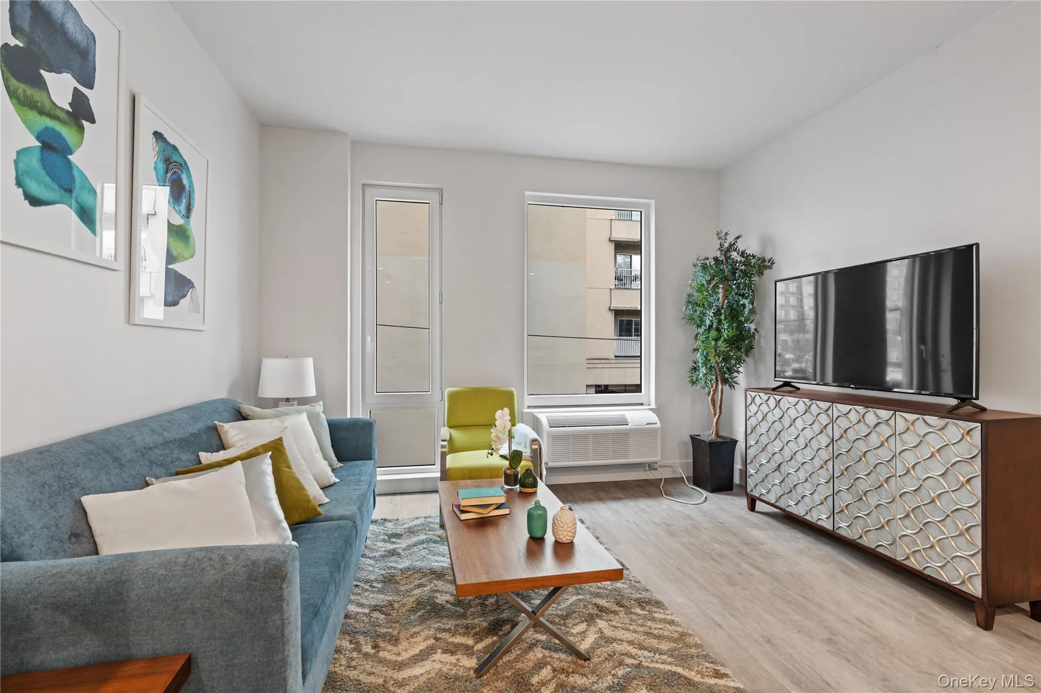Living area featuring wood finished floors Living area featuring wood finished floors