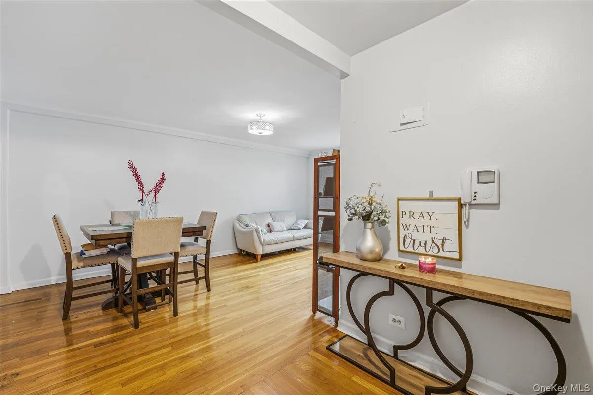 Dining area with light wood-type flooring and baseboards Dining area with light wood-type flooring and baseboards