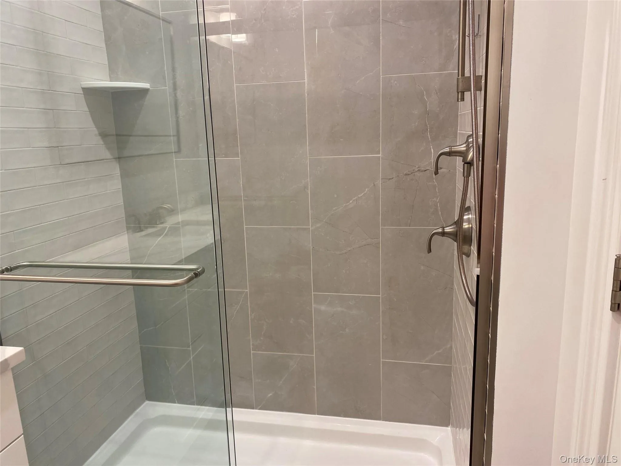 Full bath with a stall shower and vanity Full bath with a stall shower and vanity