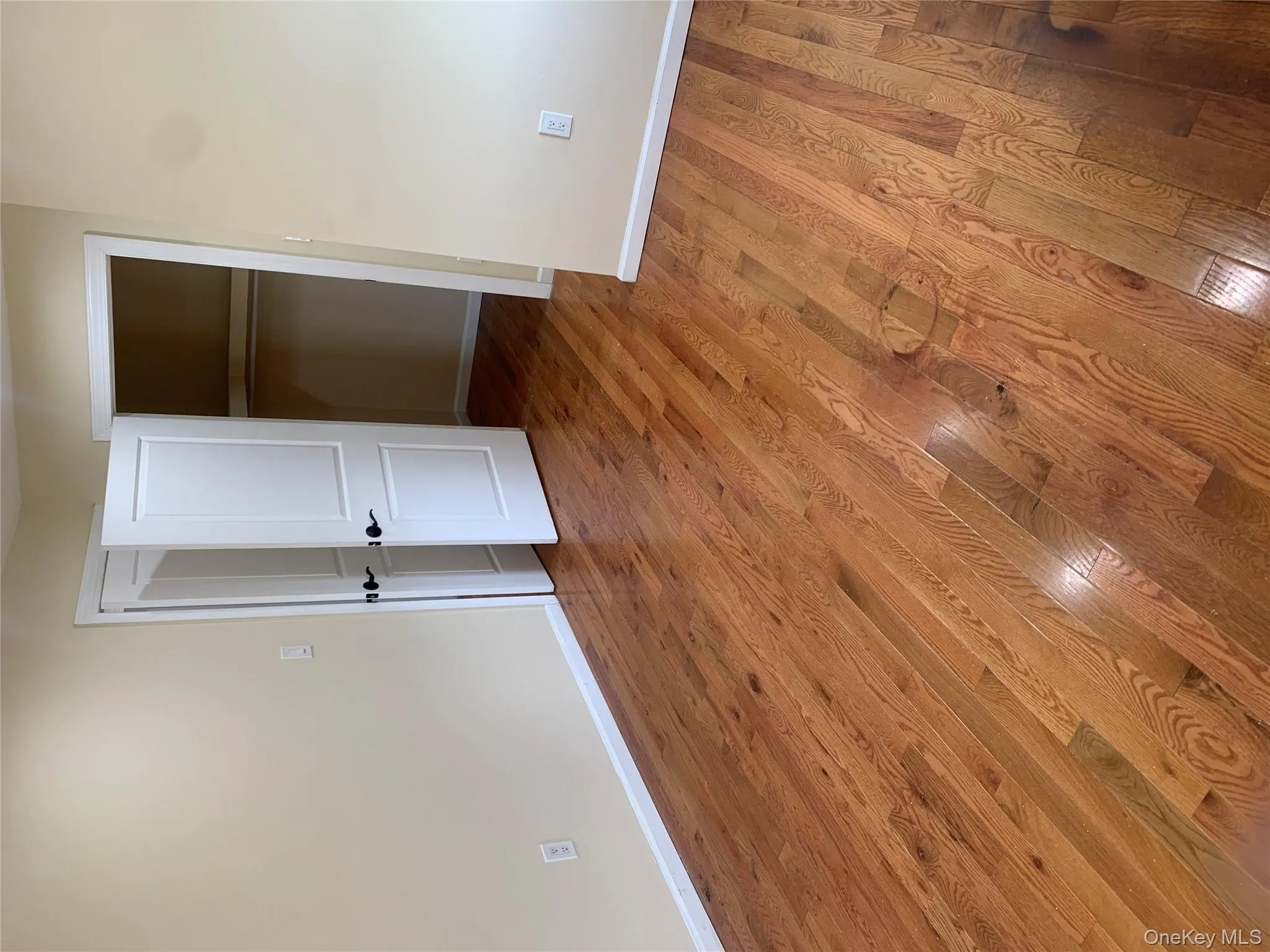 Unfurnished bedroom with light wood-style flooring Unfurnished bedroom with light wood-style flooring