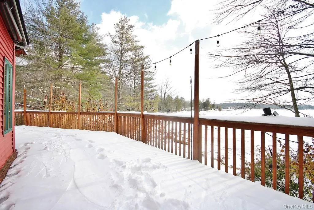 View of snow covered deck View of snow covered deck
