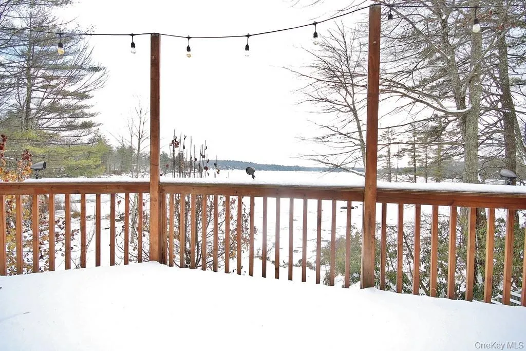 View of snow covered deck View of snow covered deck