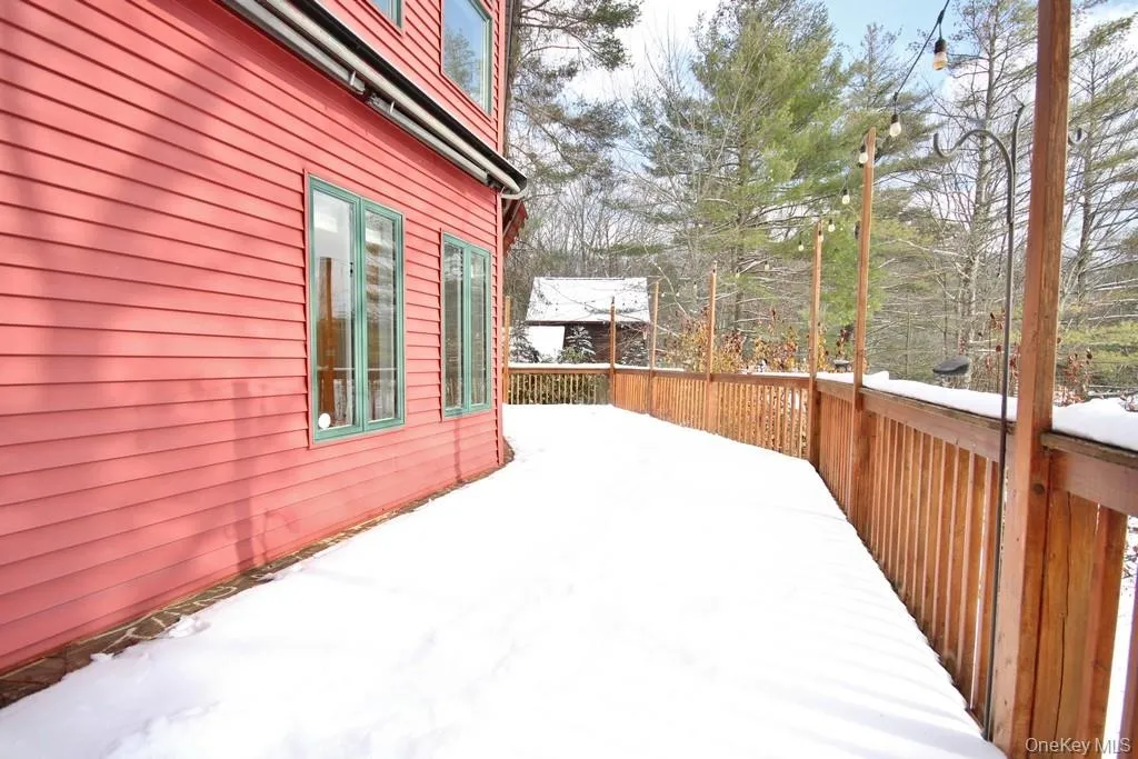 View of snow covered deck View of snow covered deck