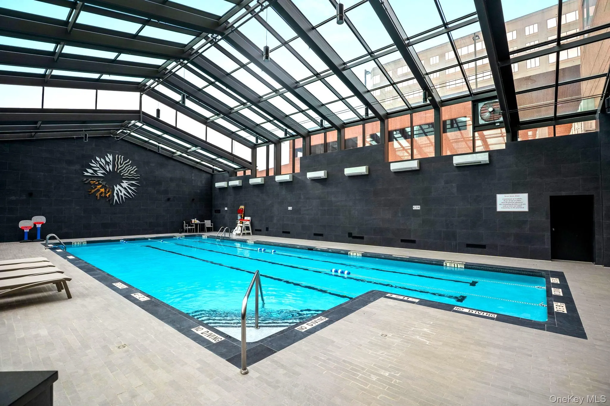 Indoor pool with a patio Indoor pool with a patio