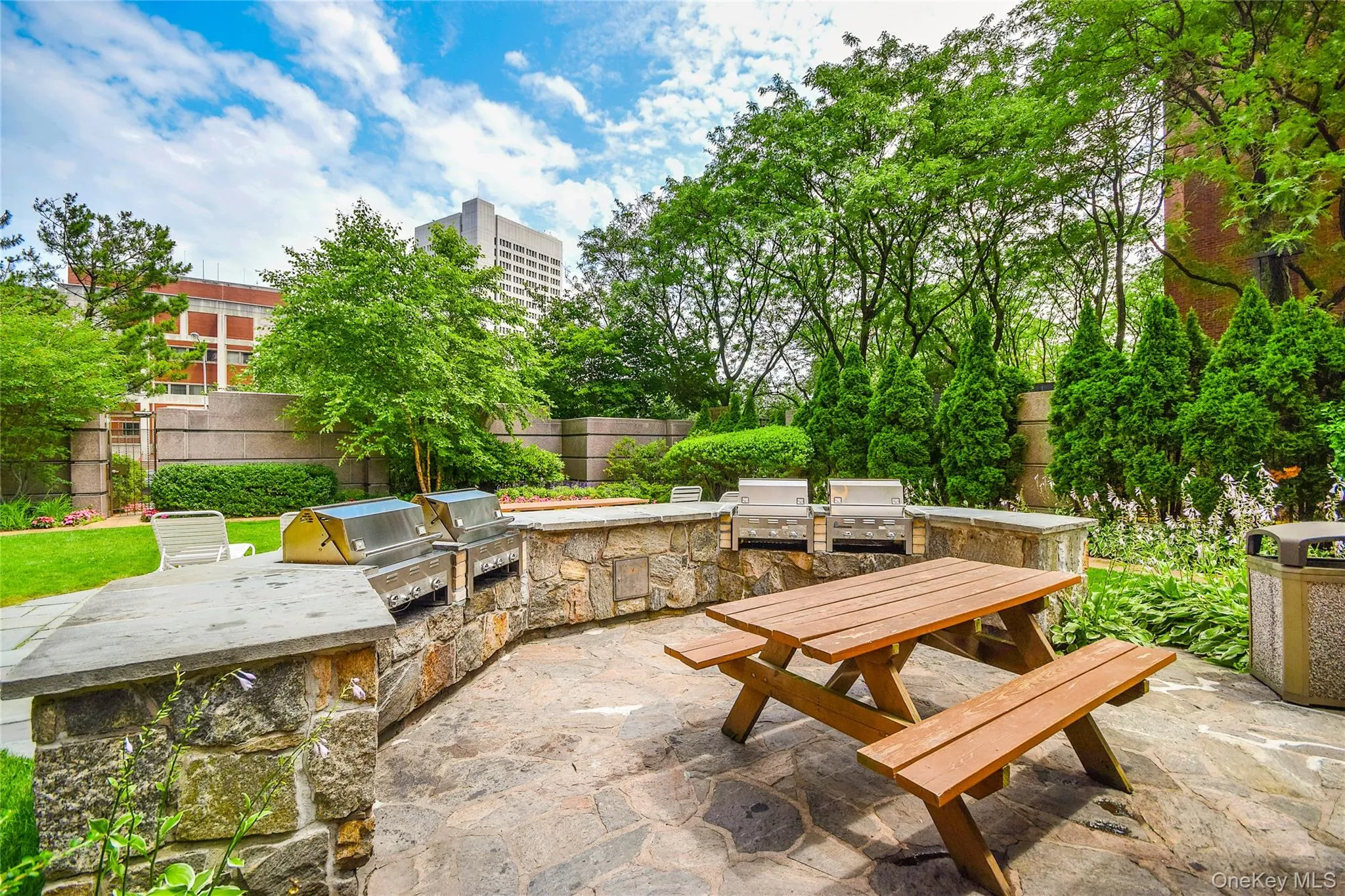 View of patio with exterior kitchen and outdoor dining space View of patio with exterior kitchen and outdoor dining space
