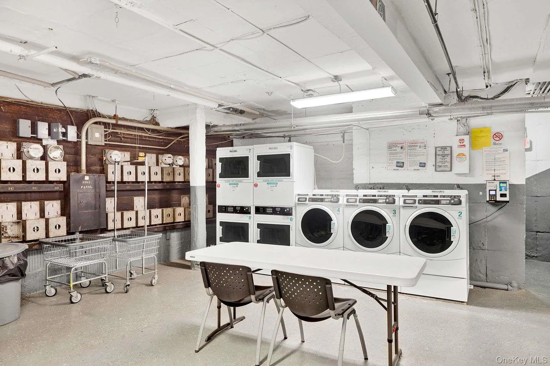 Washroom featuring washing machine and clothes dryer Washroom featuring washing machine and clothes dryer