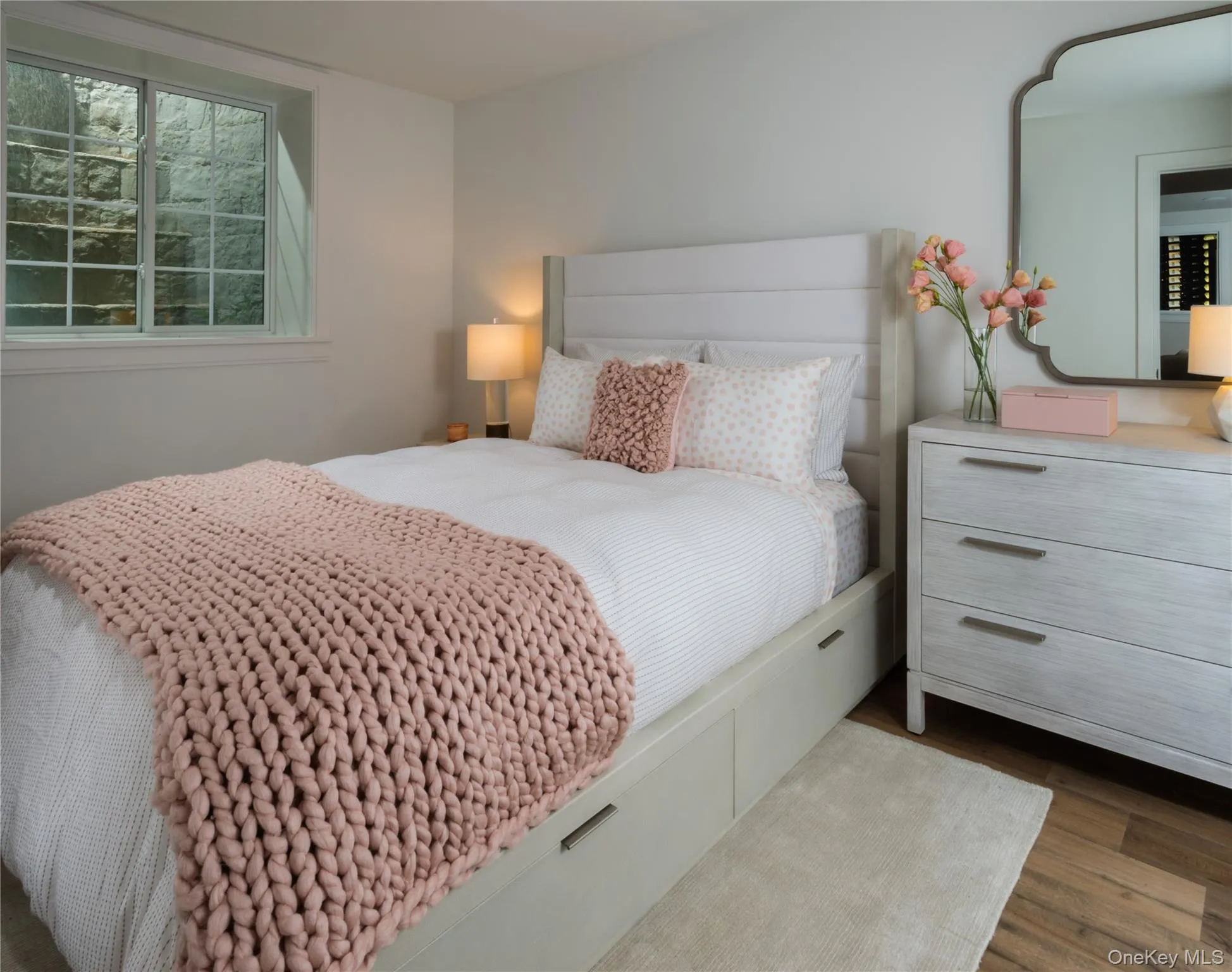 Bedroom featuring dark wood finished floors Bedroom featuring dark wood finished floors