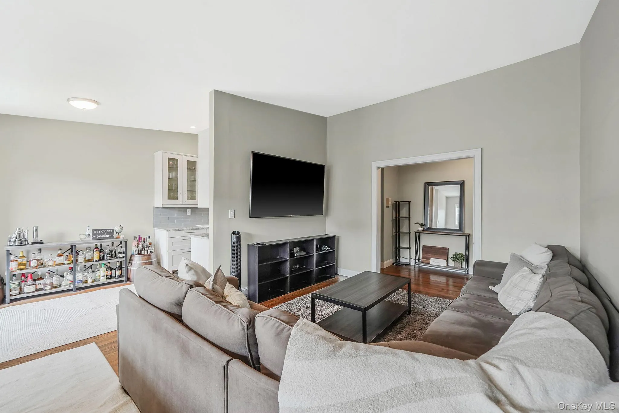 Living area featuring wood finished floors Living area featuring wood finished floors