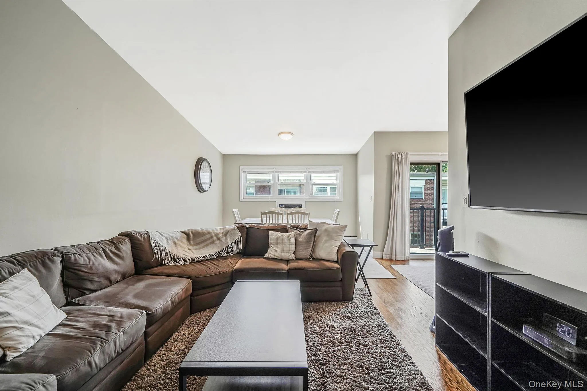 Living room with light wood finished floors Living room with light wood finished floors