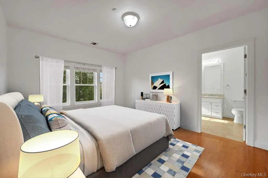 Virtually staged bedroom with en-suite bathroom Virtually staged bedroom with en-suite bathroom