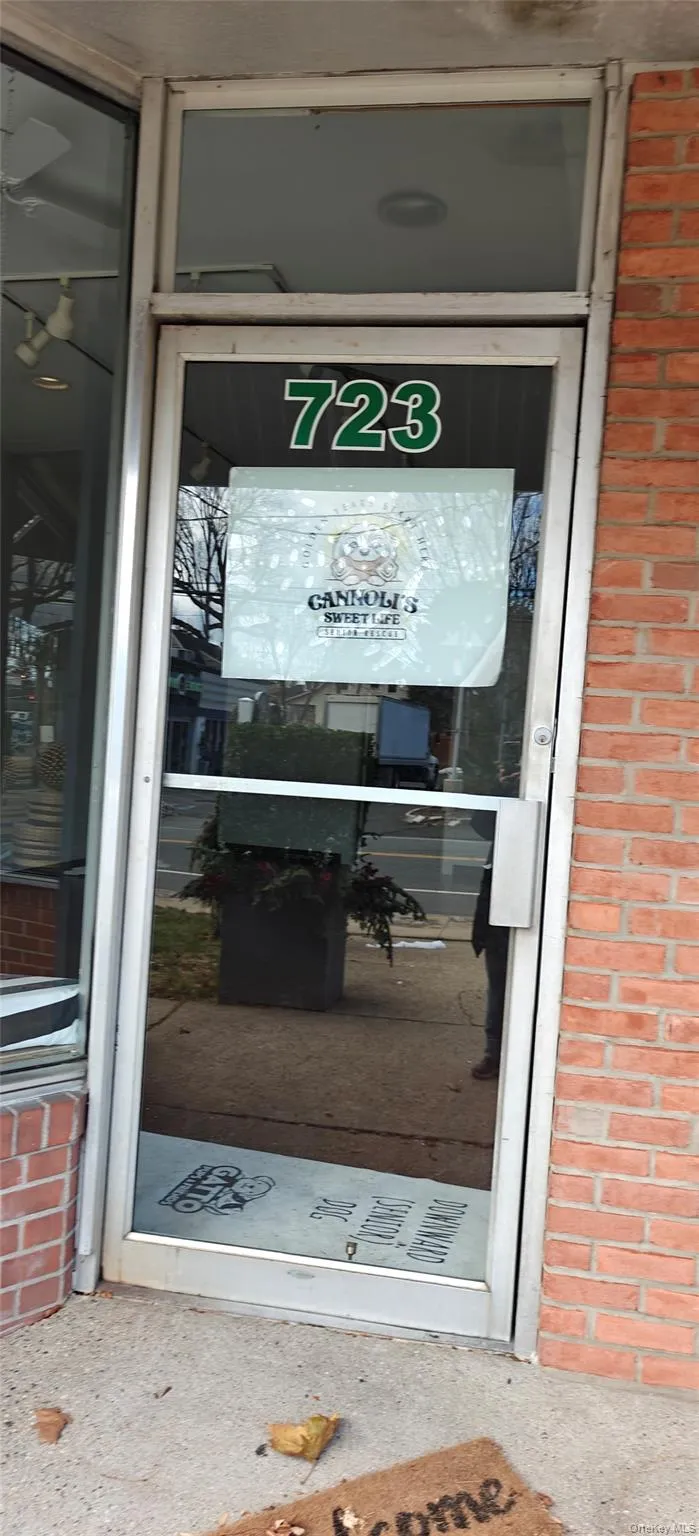 Entrance to property featuring brick siding. Entrance to property featuring brick siding.