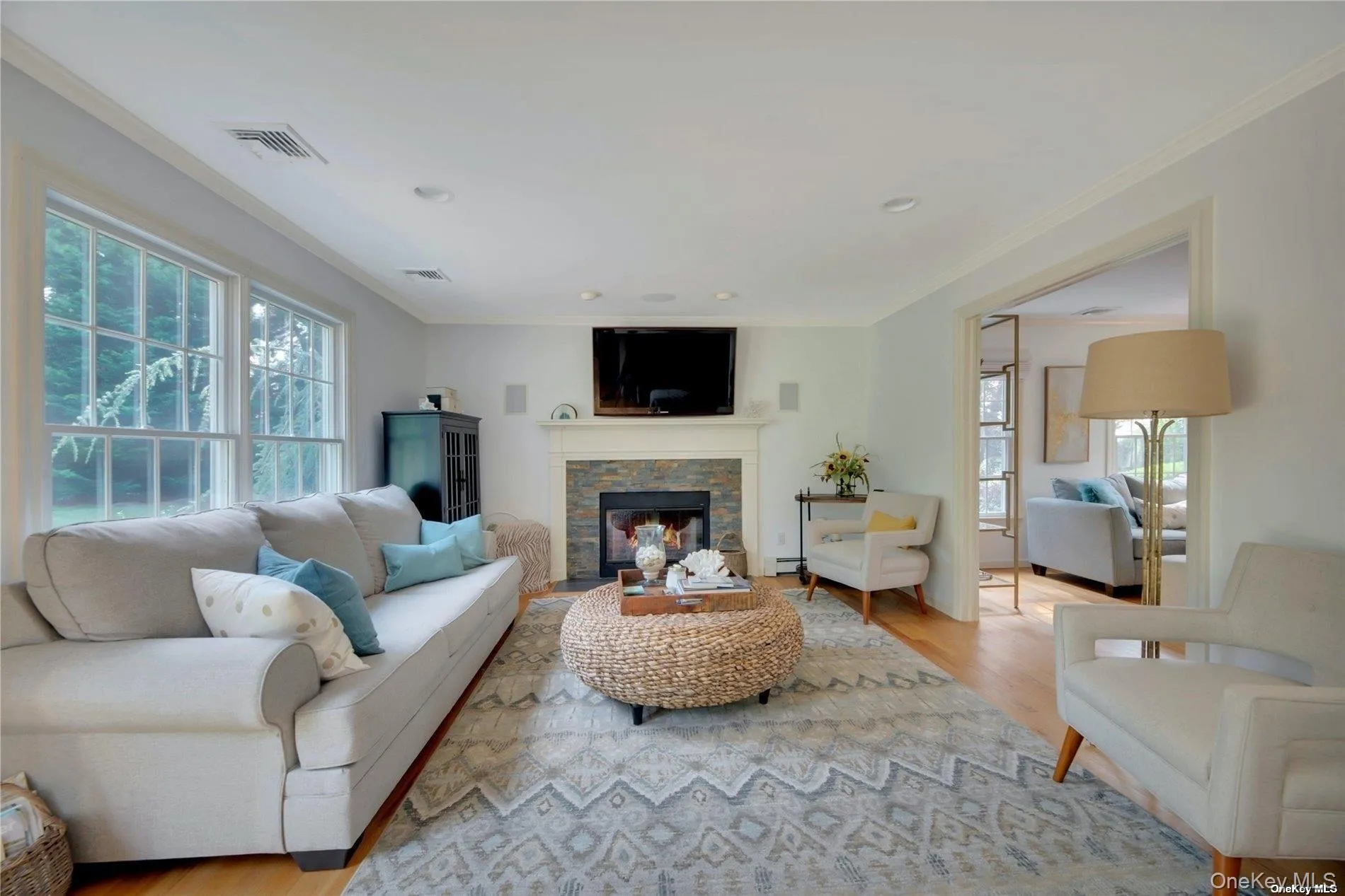 Den with ample seating and gas fireplace Den with ample seating and gas fireplace