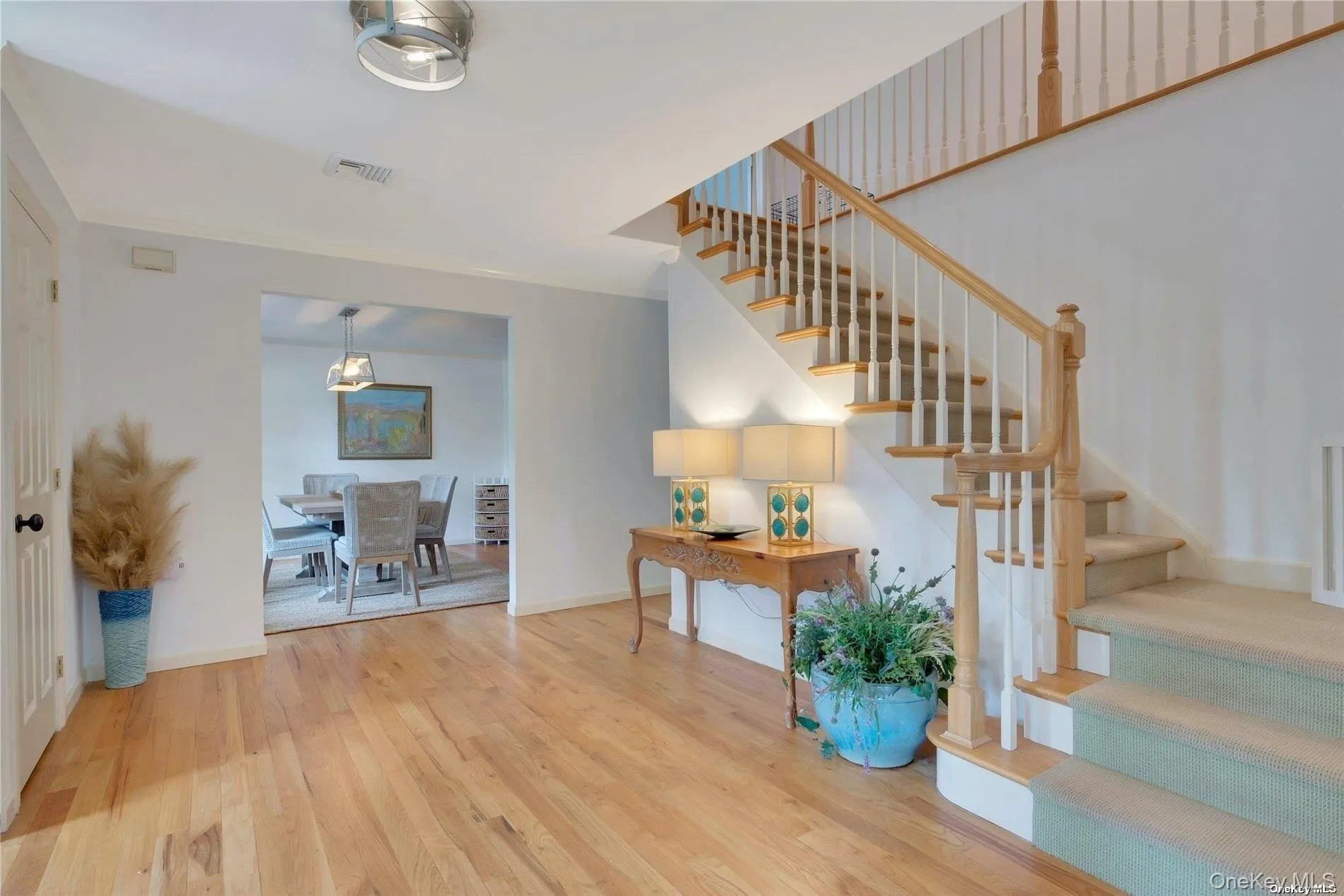 Entry foyer with view of dining room Entry foyer with view of dining room