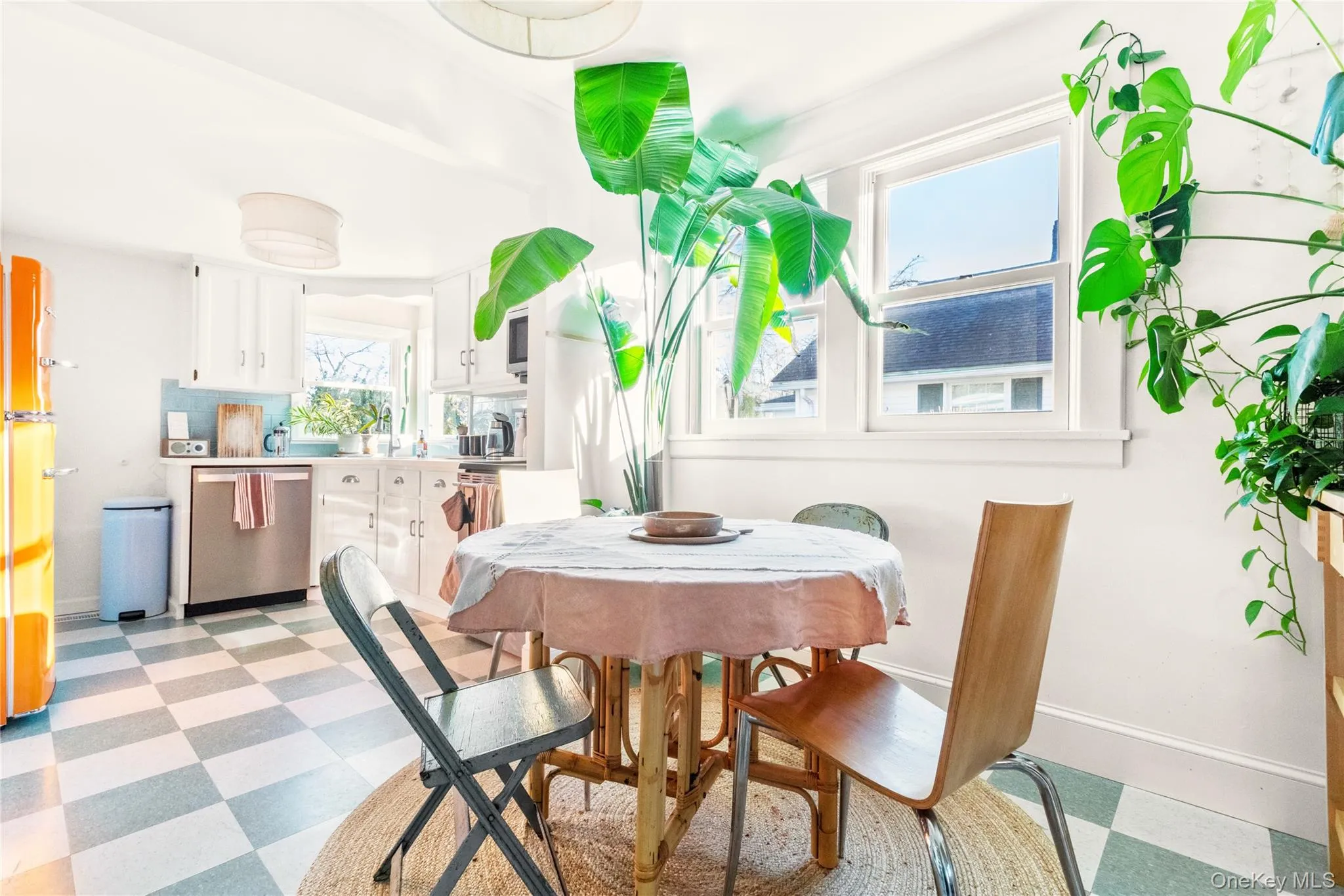 Dining space featuring light floors Dining space featuring light floors