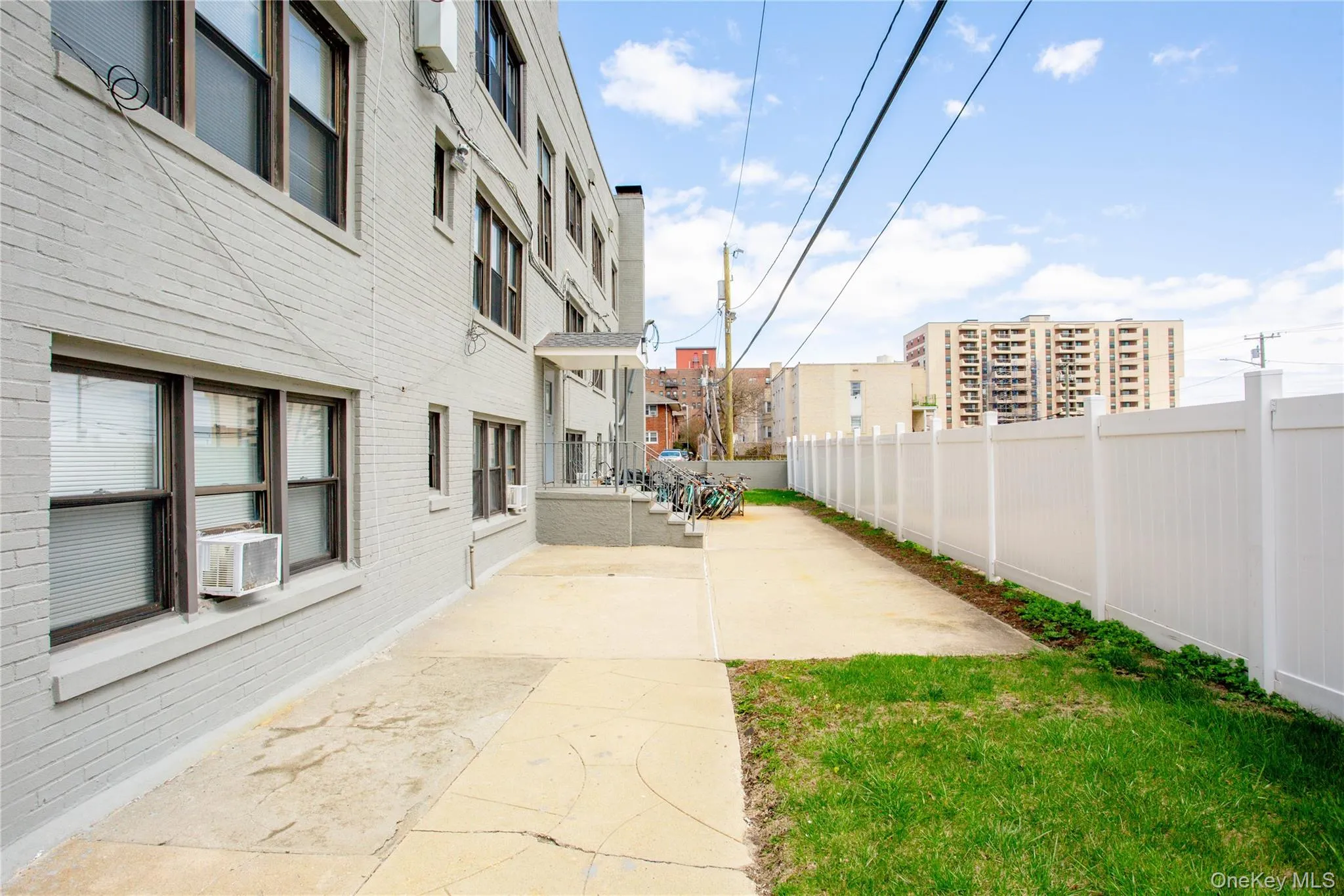 View of yard with a patio area, cooling unit, and a fenced backyard View of yard with a patio area, cooling unit, and a fenced backyard