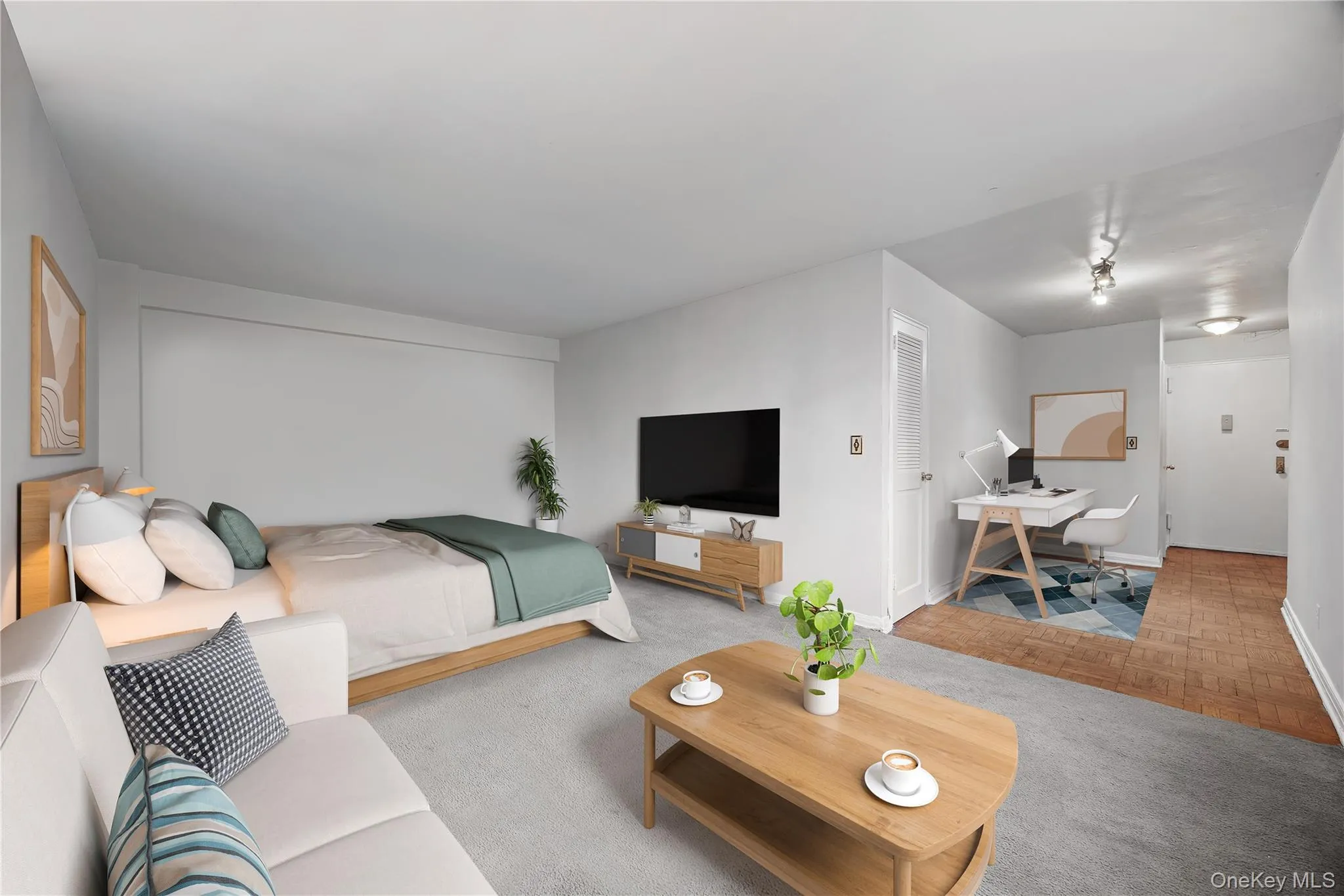 Bedroom featuring a desk, a closet, and carpet Bedroom featuring a desk, a closet, and carpet