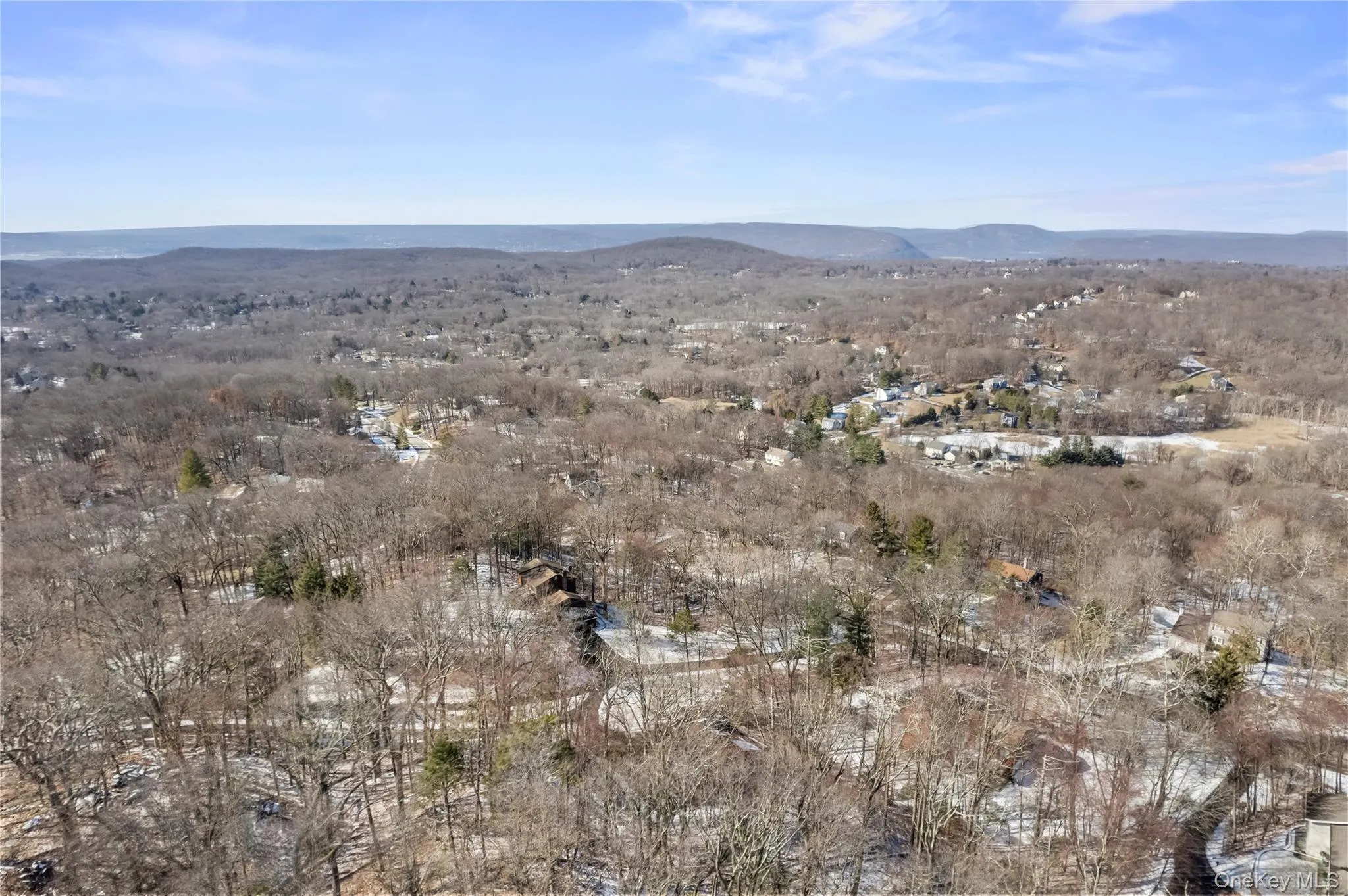 Drone / aerial view featuring a mountain view Drone / aerial view featuring a mountain view
