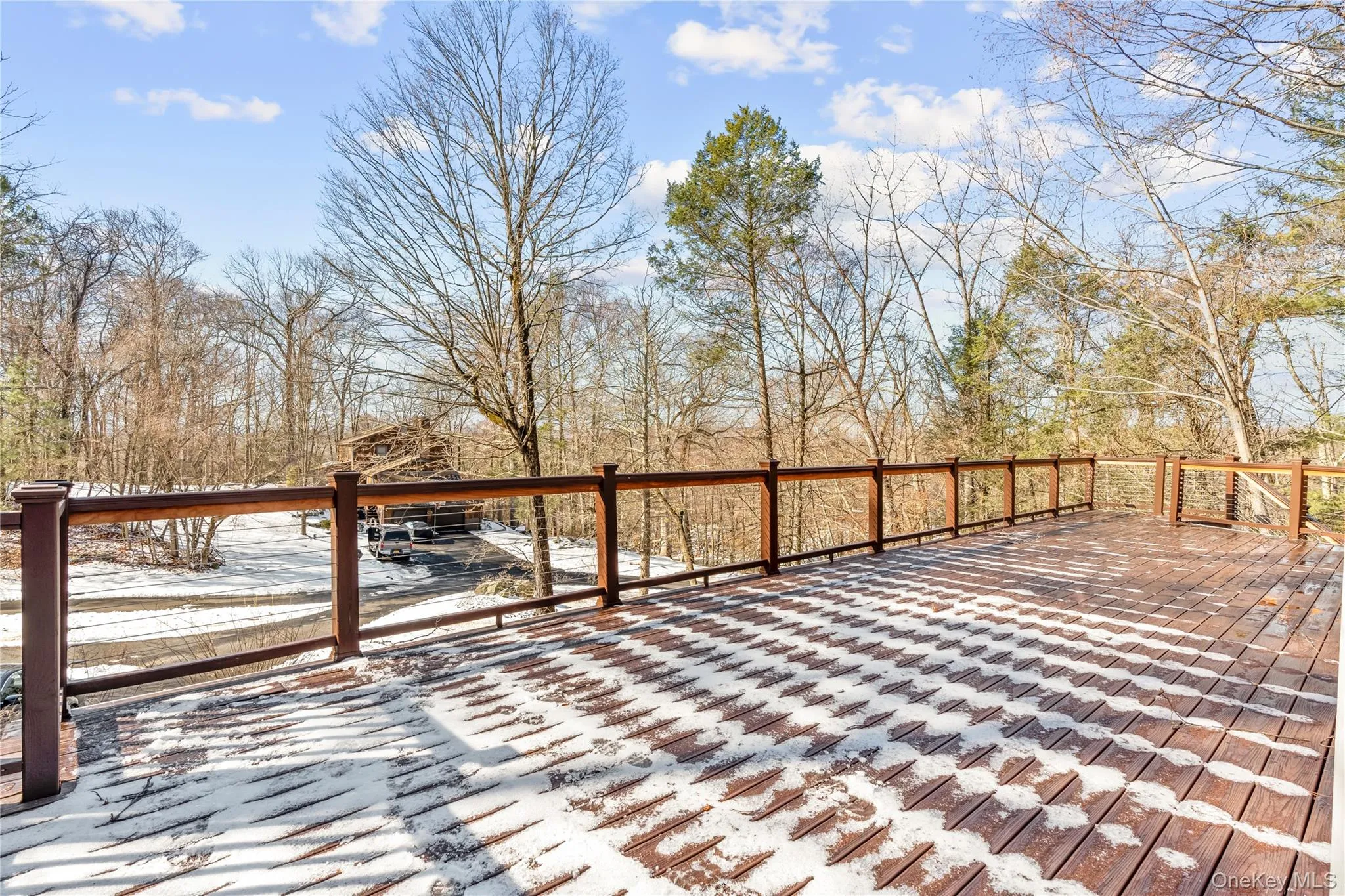 View of snow covered deck View of snow covered deck