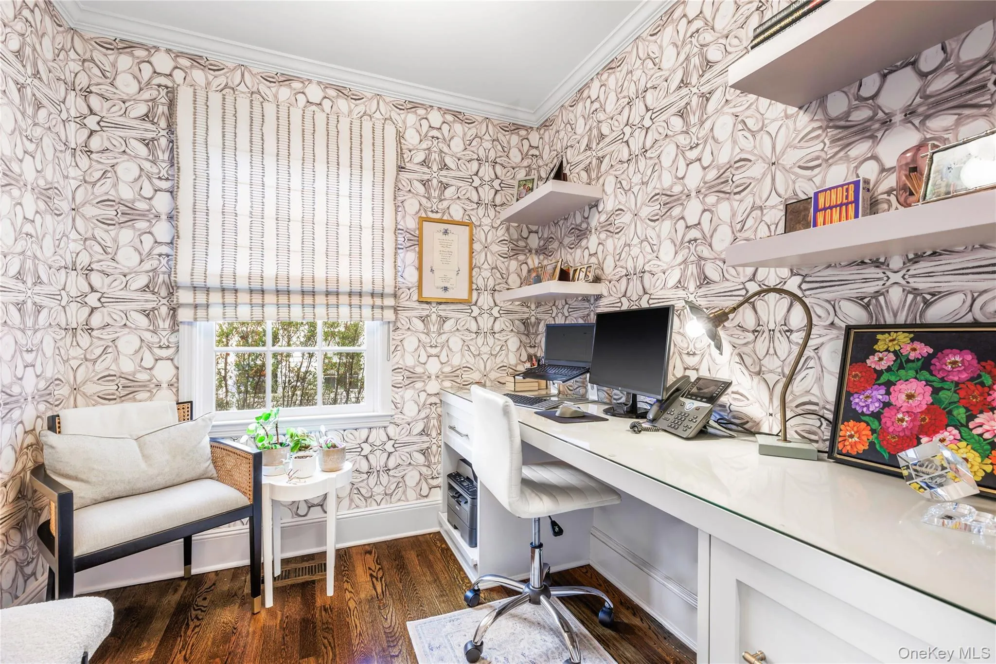 Office featuring built in work space, with pocket door Office featuring built in work space, with pocket door