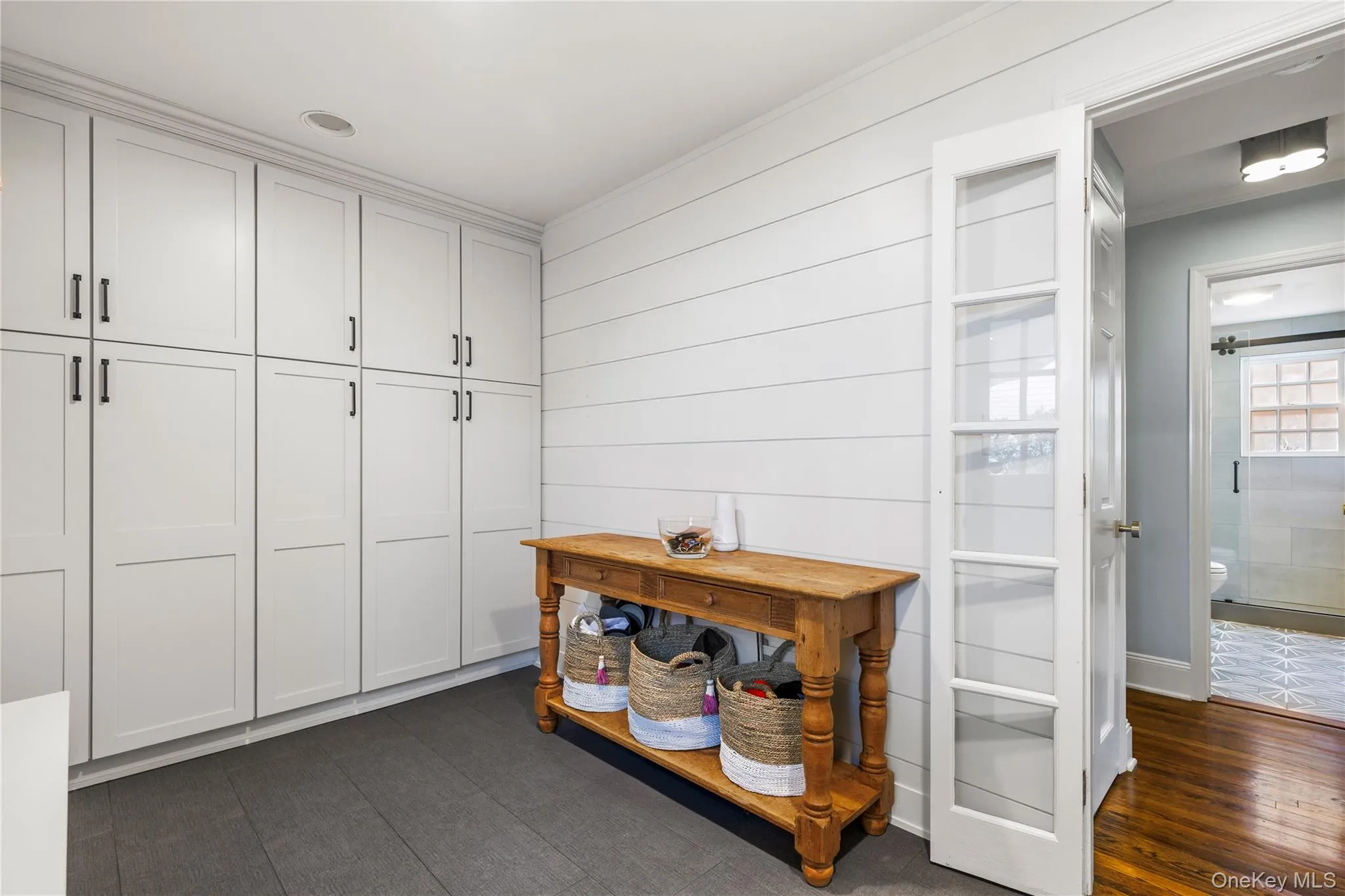 Mudroom with side entrance featuring buit in cubbies and storage spaces, Mudroom with side entrance featuring buit in cubbies and storage spaces,