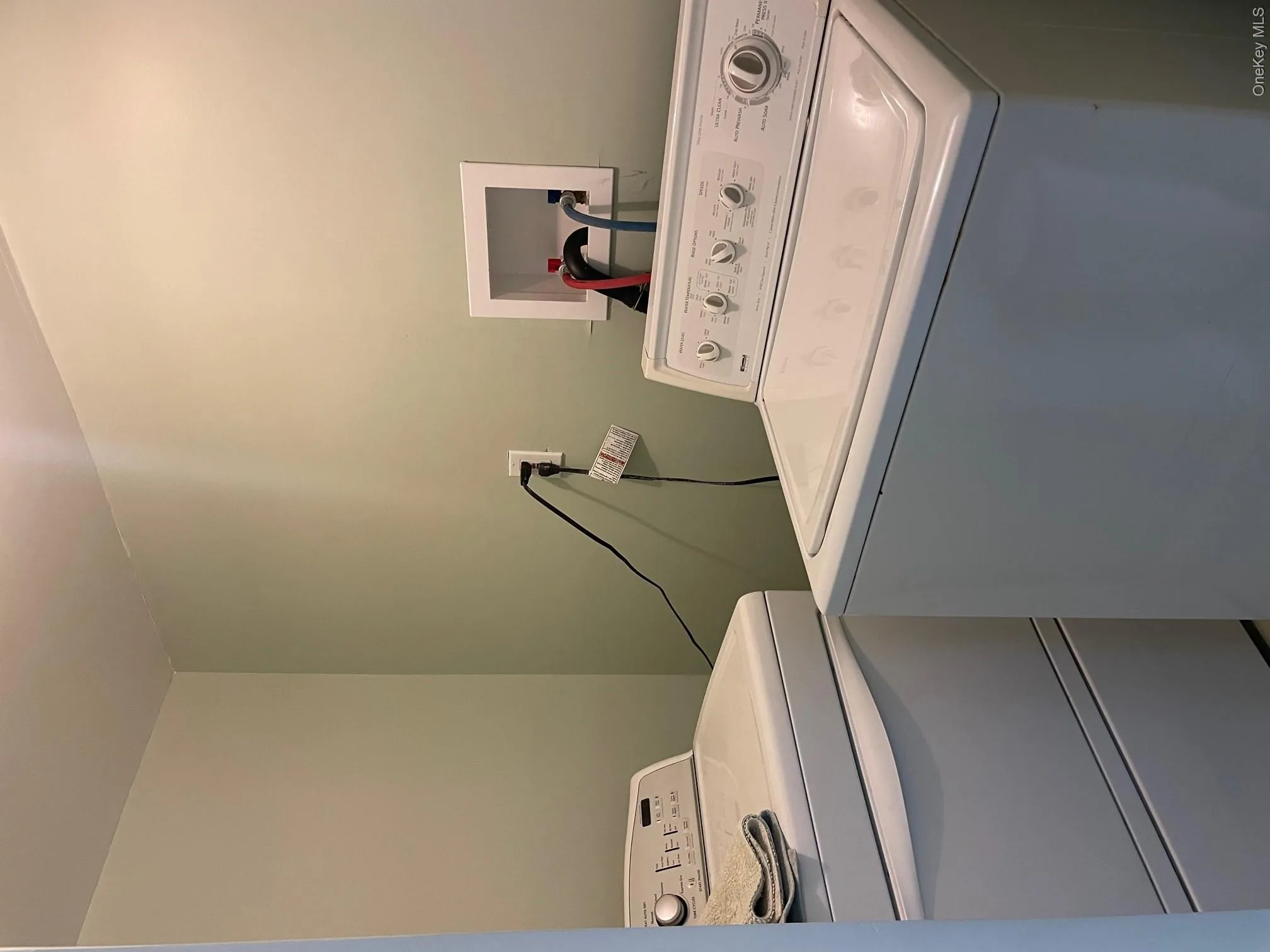 Laundry room with separate washer and dryer Laundry room with separate washer and dryer