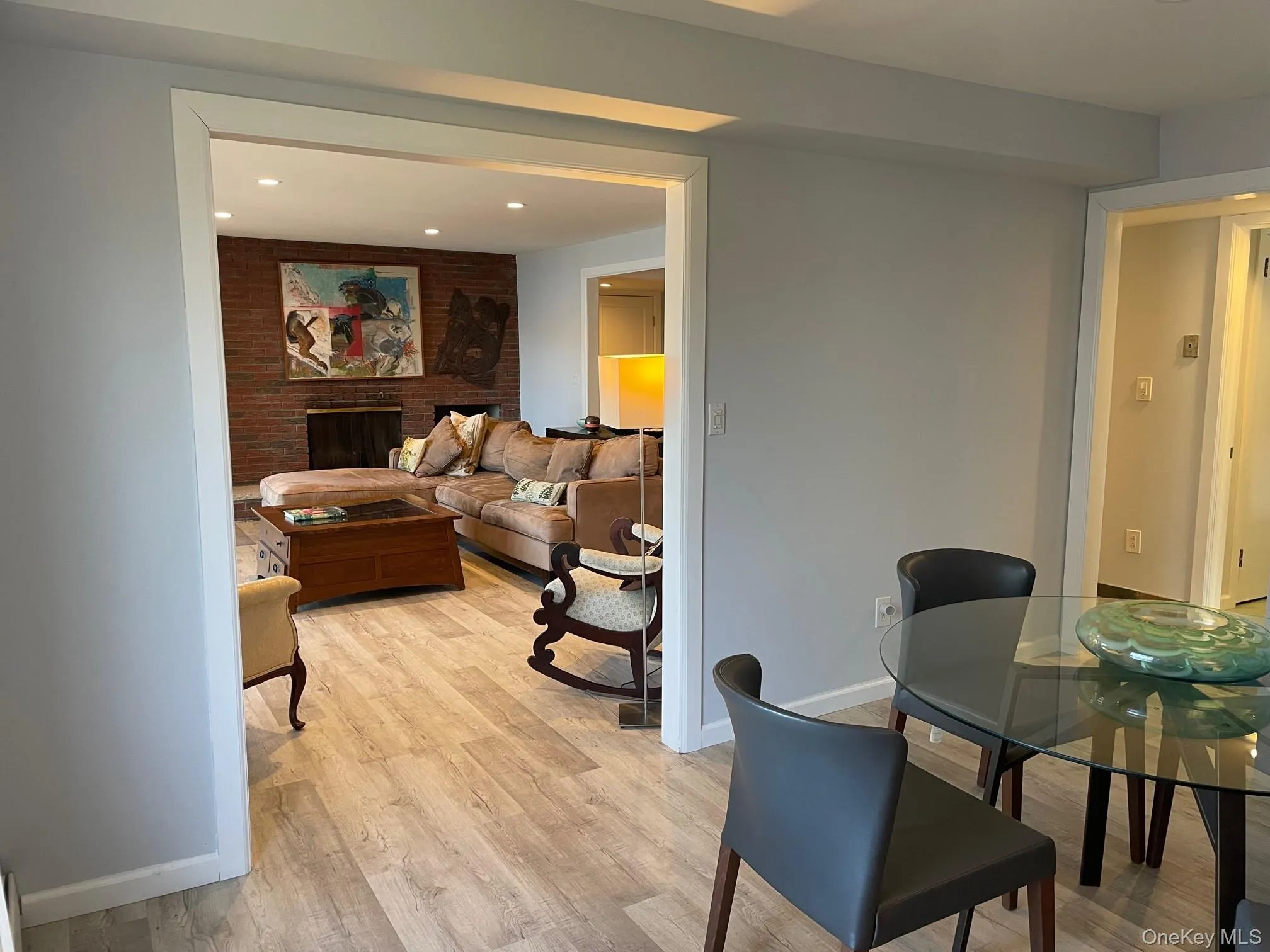 Dining room featuring light wood-style floors and recessed lighting Dining room featuring light wood-style floors and recessed lighting