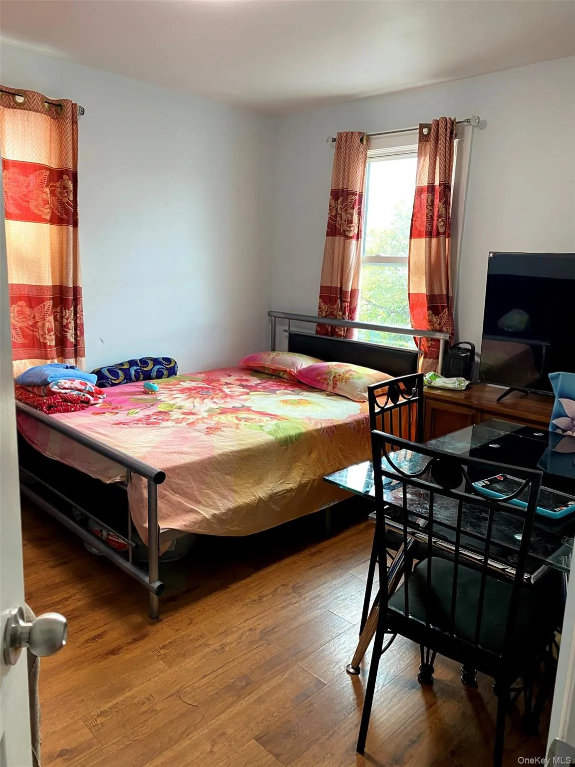 Bedroom with hardwood / wood-style floors Bedroom with hardwood / wood-style floors