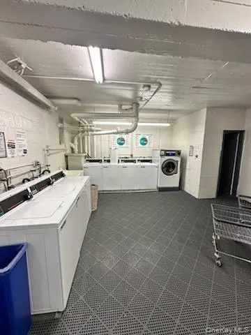 Community laundry with separate washer and dryer Community laundry with separate washer and dryer