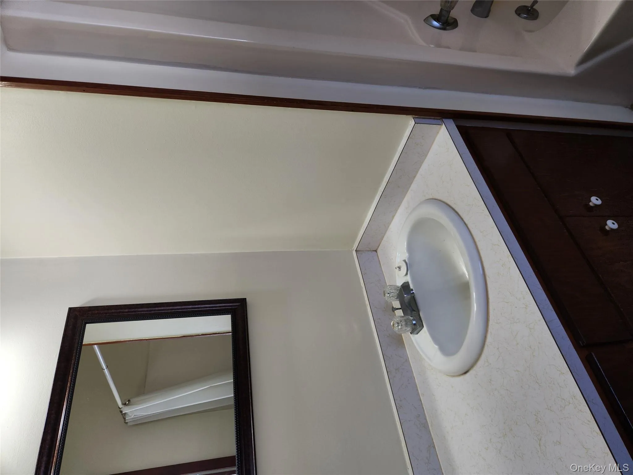 Full bathroom with vanity and shower / bath combo with shower curtain Full bathroom with vanity and shower / bath combo with shower curtain