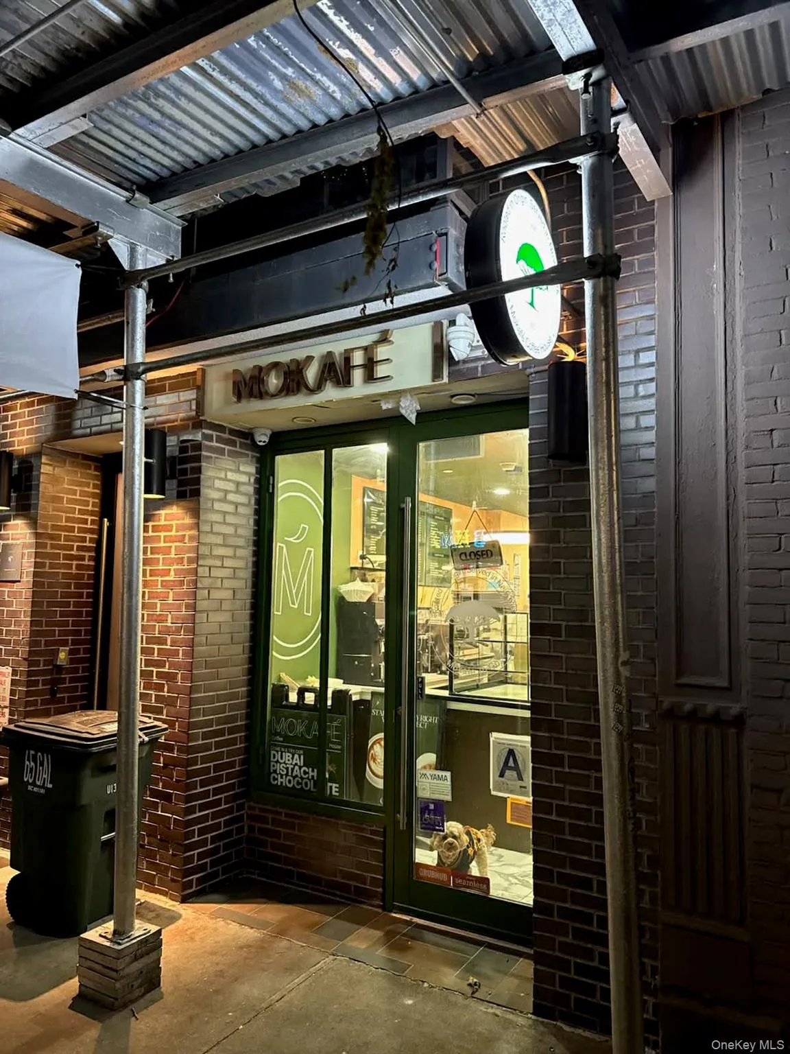 Entrance to property featuring brick siding Entrance to property featuring brick siding