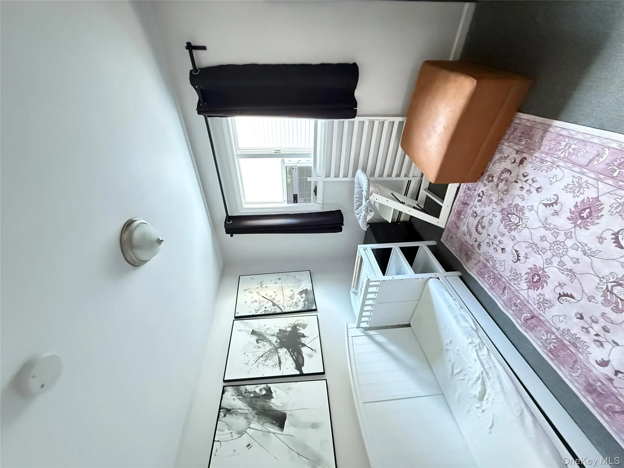 Bedroom with carpet and baseboards Bedroom with carpet and baseboards