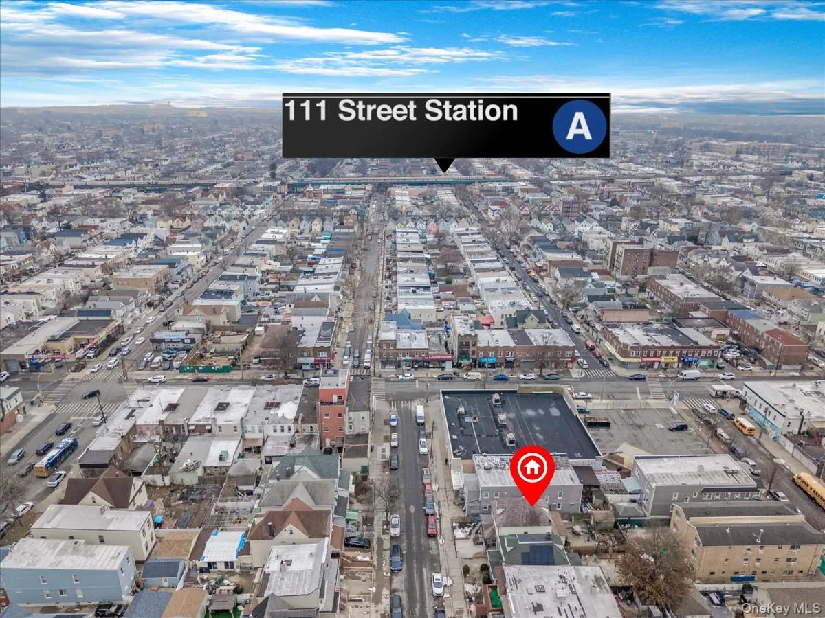 Aerial view of property's location featuring nearby urban area Aerial view of property's location featuring nearby urban area