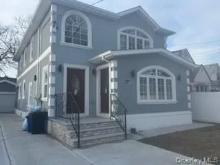 View of front of house featuring an outdoor structure, stucco siding, a detached garage, and concrete driveway View of front of house featuring an outdoor structure, stucco siding, a detached garage, and concrete driveway