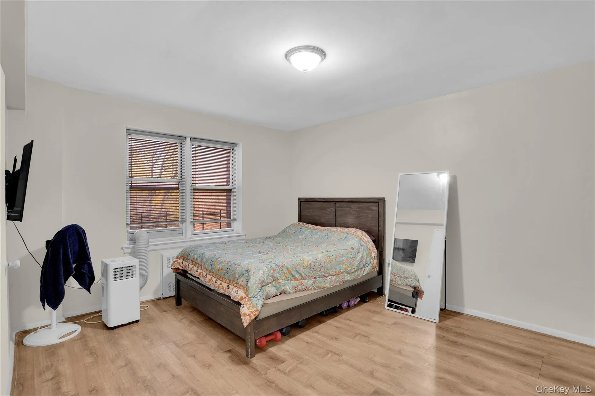 Bedroom featuring light wood-style floors Bedroom featuring light wood-style floors