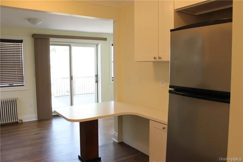 leading to living room and rear private deck leading to living room and rear private deck