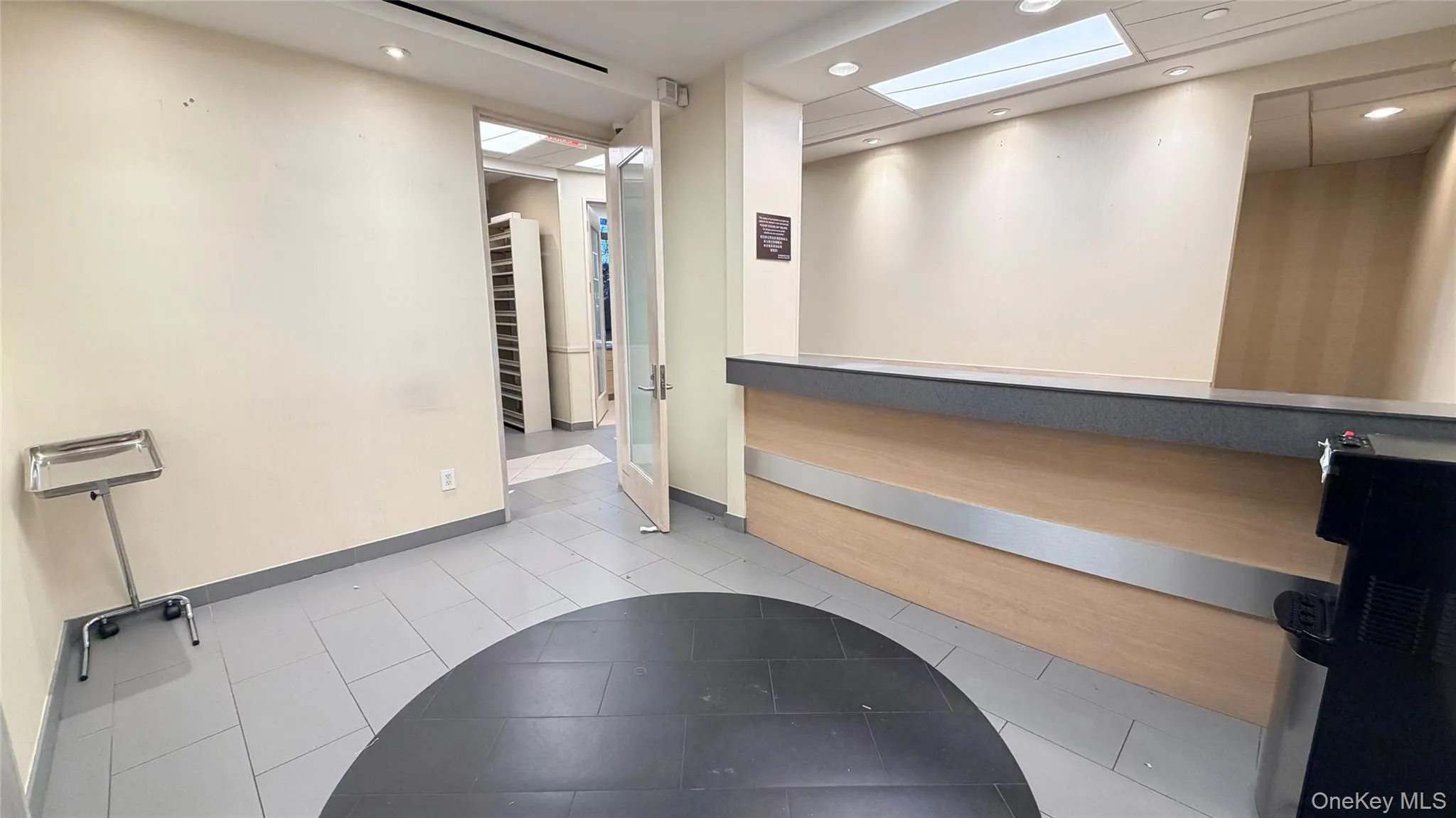 Reception featuring recessed lighting and a skylight Reception featuring recessed lighting and a skylight