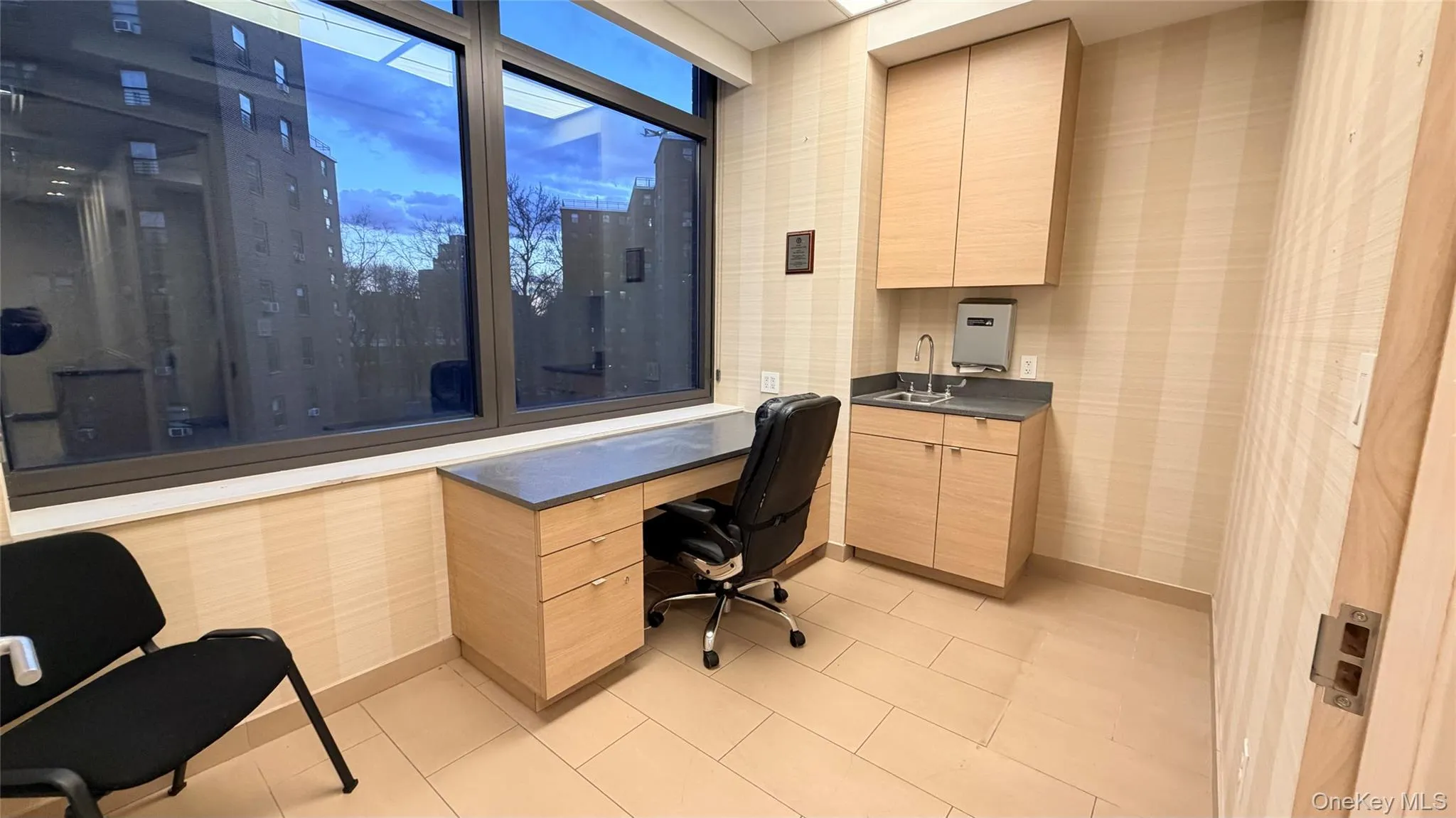 Office area featuring a sink Office area featuring a sink