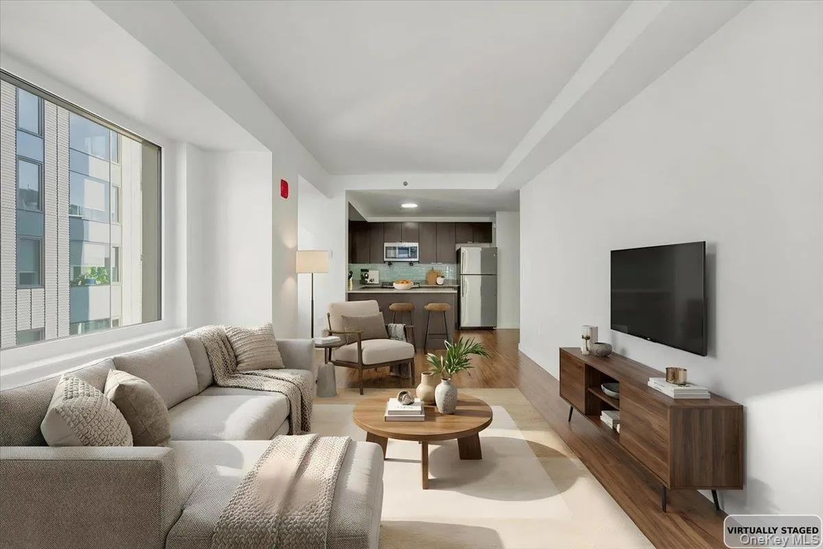 Living area featuring light wood finished floors Living area featuring light wood finished floors