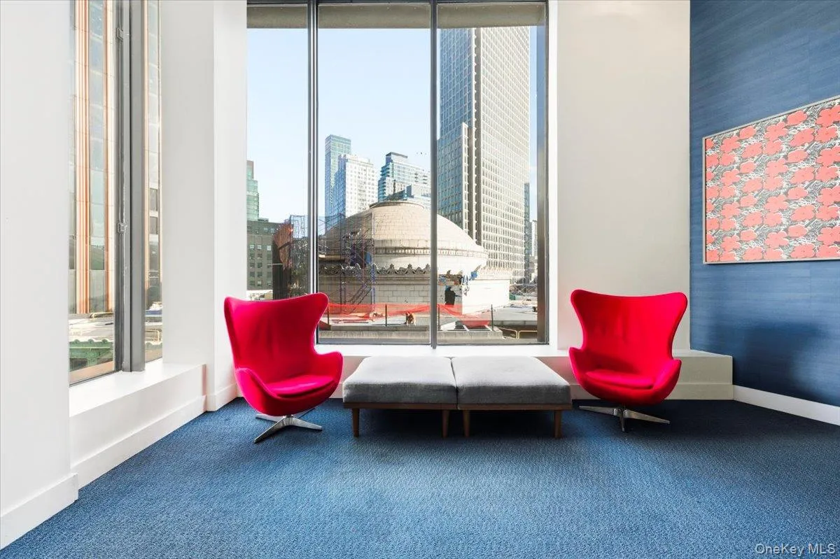 Living area featuring a city view Living area featuring a city view