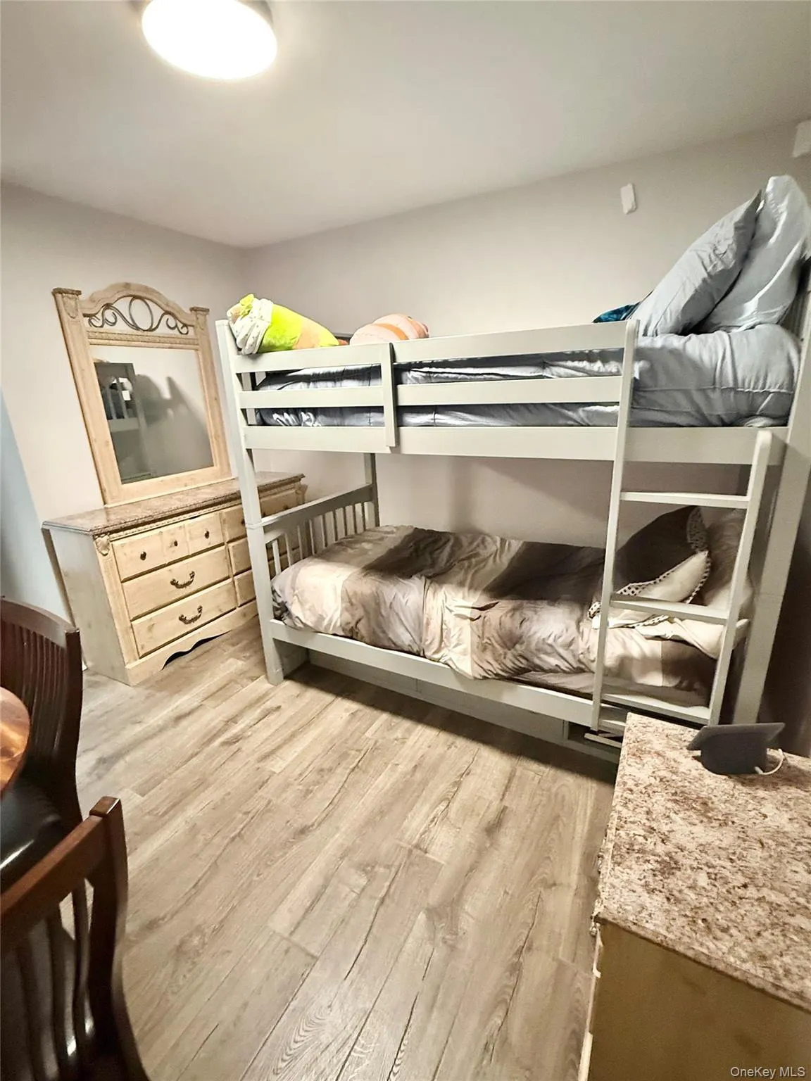 Bedroom with light wood-style floors Bedroom with light wood-style floors